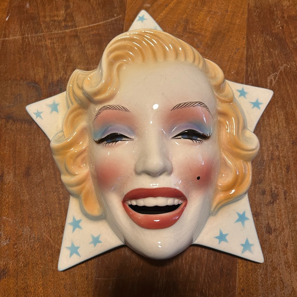 Star-Shaped Ceramic Wall Art with Blonde Figure